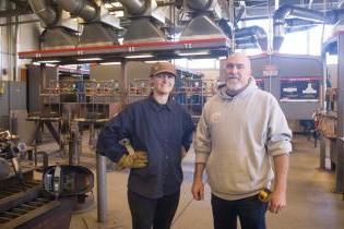 Welding Professor Mike Clark, and a VC Welding Student